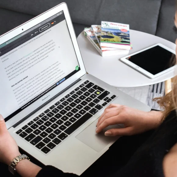 Remote worker using a laptop in one of the best work spots in Antalya, enjoying a comfortable workspace for digital nomads and remote professionals.