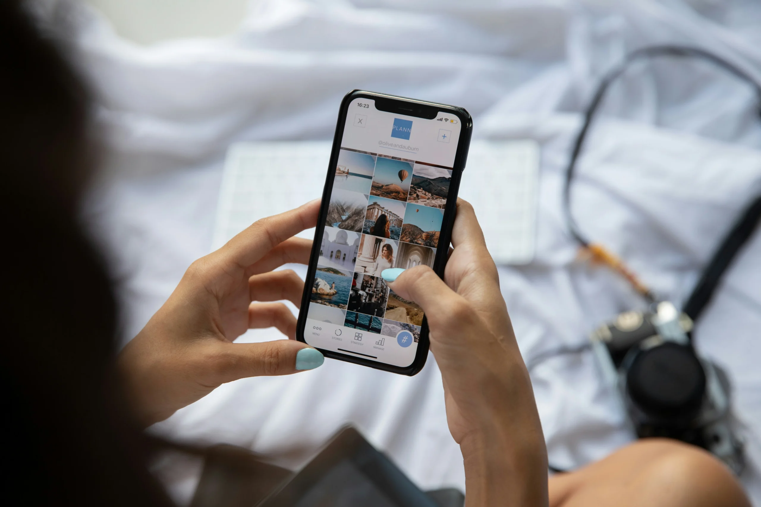 How to Stop Doomscrolling: 10 Simple Ways to Break the Habit Woman scrolling through social media on her smartphone while sitting in bed, illustrating mindless scrolling and why learning how to stop doomscrolling matters.